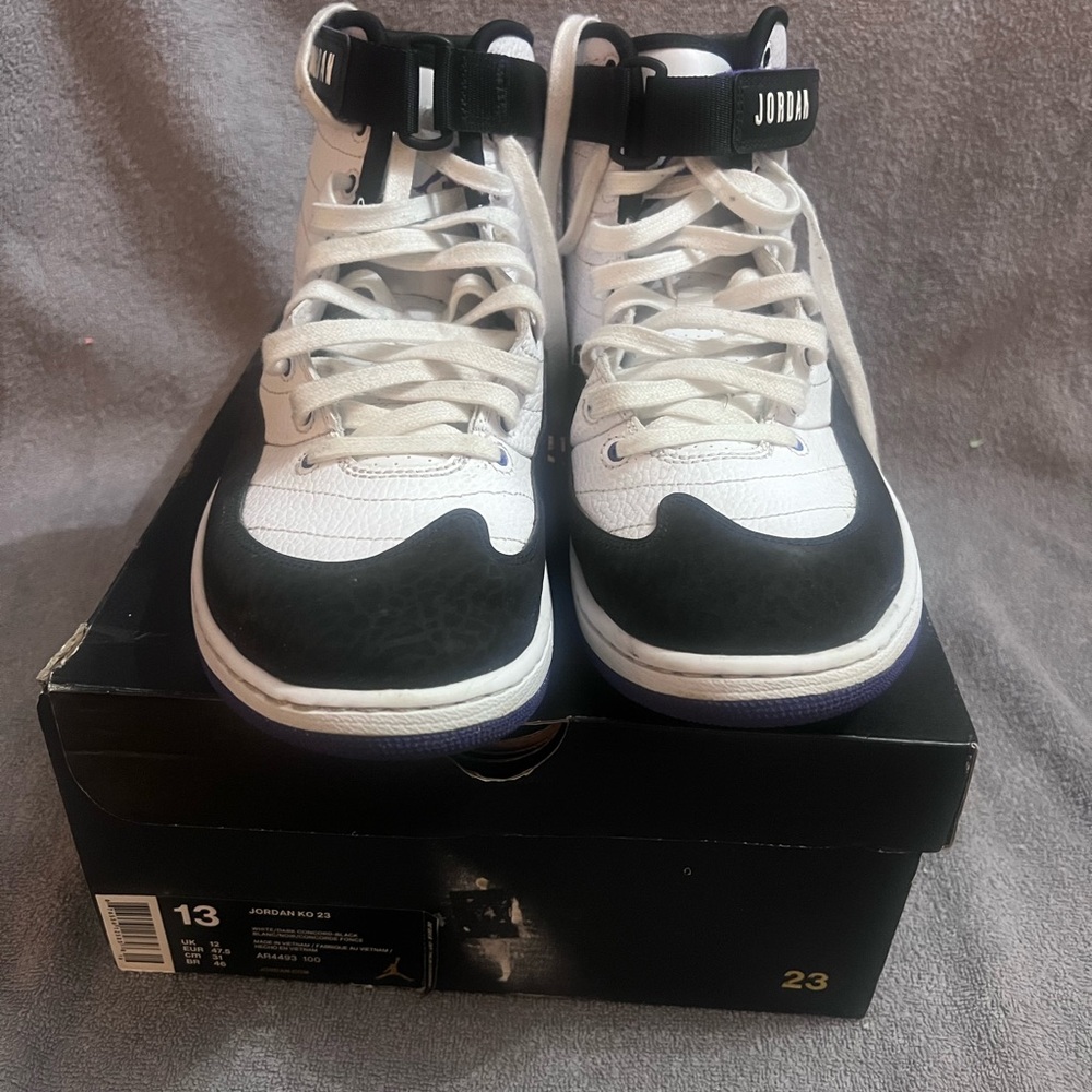 Air Jordan KO 23: White Dark Concord: High-Top Sneakers in Black and White